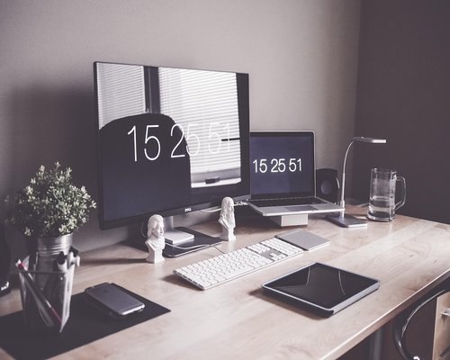 Modern minimalist workspace setup with laptop