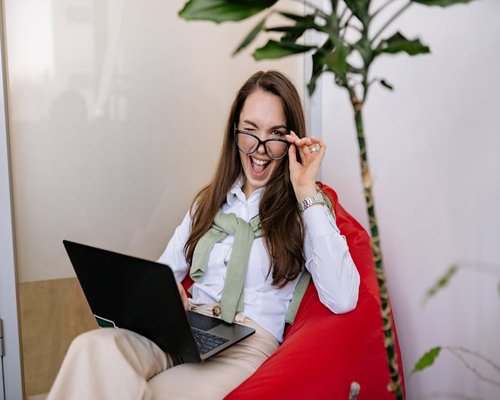 Woman sitting comfortably with good posture in office